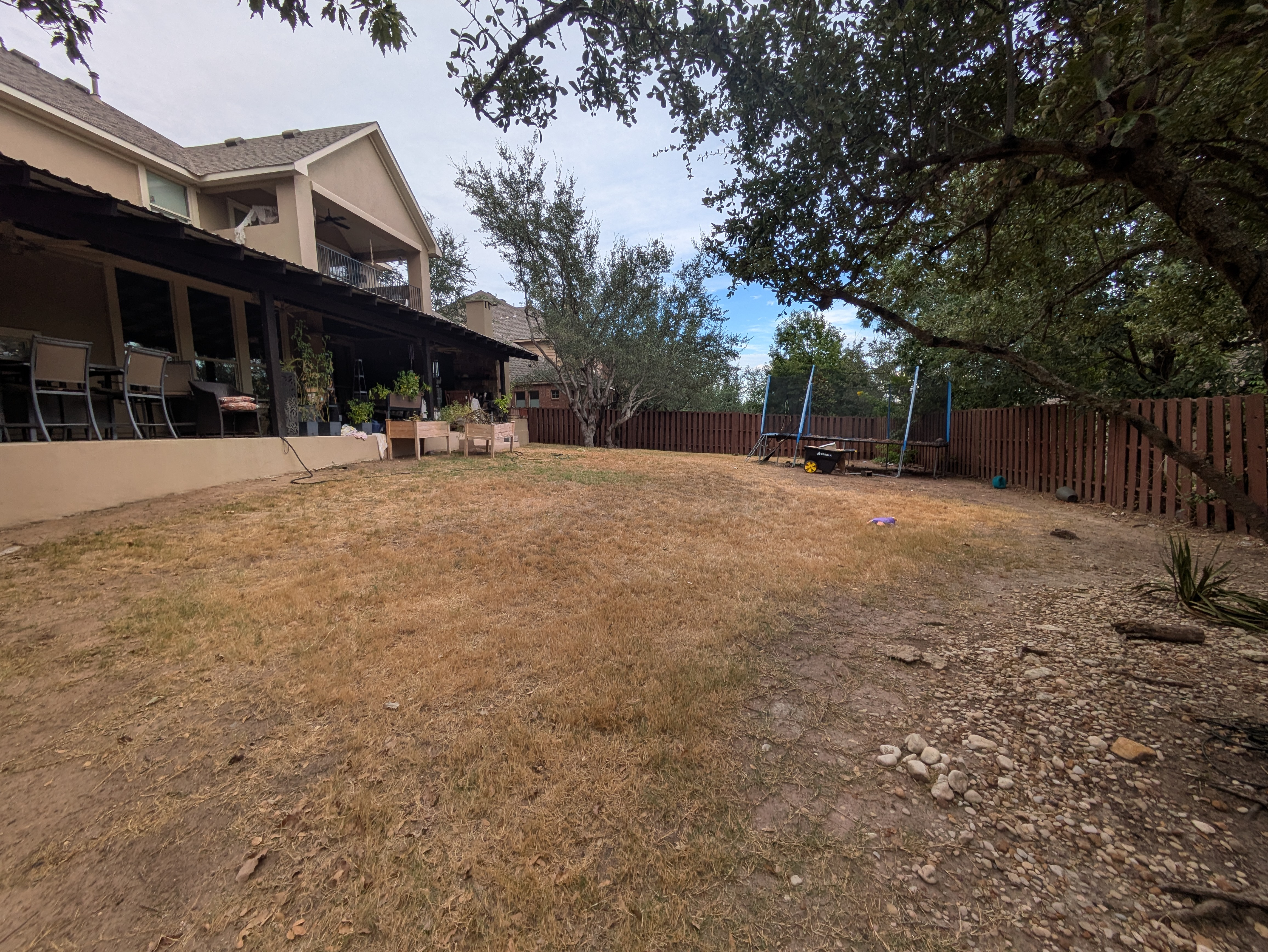 Original backyard and porch submitted for the Draftly Premium pool design project
